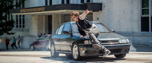 Baby (ANSEL ELGORT) is chased by the cops in TriStar Pictures' BABY DRIVER.